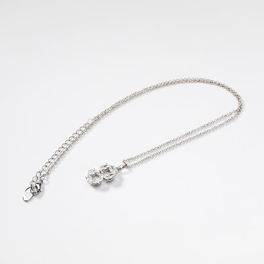Rhodium-plated metal Circles of bright ovals jewel set